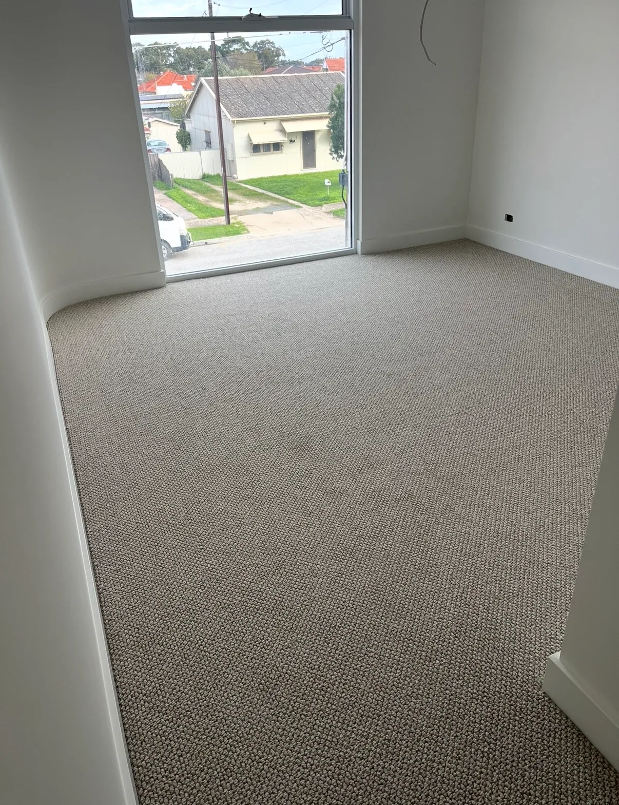New carpet in a finished bedroom